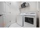Bright laundry room with a full size washer and dryer, and plenty of storage space at 560 Dutch Valley Ne Rd # 209, Atlanta, GA 30324