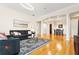 Spacious living room with hardwood floors, arched doorways, and modern decor at 560 Dutch Valley Ne Rd # 209, Atlanta, GA 30324
