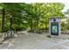 Paved overlook area in a park setting, complete with seating, signage, and views of lush green trees at 560 Dutch Valley Ne Rd # 209, Atlanta, GA 30324