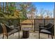 Outdoor patio with seating and a view of the surrounding landscape at 560 Dutch Valley Ne Rd # 209, Atlanta, GA 30324