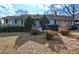Ranch style home with mature landscaping and a spacious yard at 141 Hill St, Roswell, GA 30075