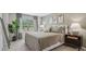 King-size bed in a bedroom with natural light and decor at 2094 Moss Hill Road, Stone Mountain, GA 30088