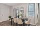 Elegant dining room with a dark wood table and modern chairs at 2094 Moss Hill Road, Stone Mountain, GA 30088