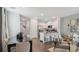 Open concept dining area and kitchen with hardwood floors at 2094 Moss Hill Road, Stone Mountain, GA 30088