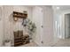 Inviting entryway with bench, coat rack, and shelving at 2094 Moss Hill Road, Stone Mountain, GA 30088