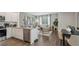 Open concept kitchen with island and living area view at 2094 Moss Hill Road, Stone Mountain, GA 30088