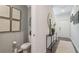 Powder room features a toilet and sink, and is conveniently located at 2094 Moss Hill Road, Stone Mountain, GA 30088