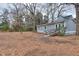 House exterior with a ramp and spacious yard at 23 Club Dr, Locust Grove, GA 30248