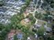 An aerial view of a charming home nestled among mature trees in a serene, well-established neighborhood at 72 Bishop Nw Dr, Cartersville, GA 30121