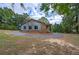 Charming single-story home featuring brick and vinyl siding, surrounded by a circular driveway at 72 Bishop Nw Dr, Cartersville, GA 30121