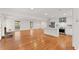 Open kitchen with a center island and stainless appliances, with hardwood floors at 4540 Club Valley Ne Dr, Atlanta, GA 30319