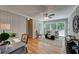 Cozy living room with neutral tones, large windows, hardwood floors, and a charming, relaxing atmosphere at 4540 Club Valley Ne Dr, Atlanta, GA 30319