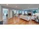 Bright and airy living room with hardwood floors, a cozy fireplace, and an open concept layout at 4540 Club Valley Ne Dr, Atlanta, GA 30319