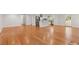 Open floor plan with light hardwood flooring connecting the living room and kitchen at 4540 Club Valley Ne Dr, Atlanta, GA 30319