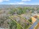 View of the approximate property lines with trees, a glimpse of the city skyline, and surrounding homes nearby at 4540 Club Valley Ne Dr, Atlanta, GA 30319