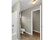 Bathroom features a toilet, shower, and bright lighting at 1016 Weatherwood Pl, Conyers, GA 30012