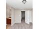 Carpeted bedroom with adjacent bathroom featuring vanity and sink at 1016 Weatherwood Pl, Conyers, GA 30012