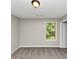 Bedroom featuring carpet flooring, grey walls, and a window at 1016 Weatherwood Pl, Conyers, GA 30012
