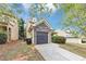 Charming townhome with a stone-accented front and attached garage at 1016 Weatherwood Pl, Conyers, GA 30012