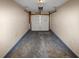 A view of the empty, attached one car garage at 1016 Weatherwood Pl, Conyers, GA 30012