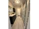 Well-lit bathroom with modern vanity, tile flooring, and stylish shower curtain at 1929 Hazelwood Se Dr, Marietta, GA 30067