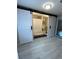 Modern bathroom featuring barn door, neutral tile, and walk-in shower and a toilet at 1929 Hazelwood Se Dr, Marietta, GA 30067