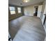 Serene bedroom with tile floors, neutral walls, and abundant natural light, creating a calming retreat at 1929 Hazelwood Se Dr, Marietta, GA 30067