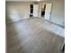 Spacious bedroom with neutral walls, tile floors, and convenient access to adjacent rooms at 1929 Hazelwood Se Dr, Marietta, GA 30067