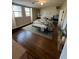 Bright bedroom featuring a plush bed with floral bedding, hardwood floors, and natural light at 1929 Hazelwood Se Dr, Marietta, GA 30067