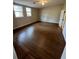 Large bedroom with hardwood floors, bright windows, and a neutral color scheme providing a blank canvas at 1929 Hazelwood Se Dr, Marietta, GA 30067
