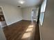 Spacious room with hardwood floors and natural light from the windows at 1929 Hazelwood Se Dr, Marietta, GA 30067