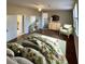 Bright bedroom featuring natural light, hardwood floors, and sitting area with an accent chair at 1929 Hazelwood Se Dr, Marietta, GA 30067