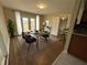 Inviting dining room with hardwood floors, neutral paint, and plenty of natural light at 1929 Hazelwood Se Dr, Marietta, GA 30067
