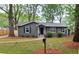 Charming single-story home with a well-maintained lawn and inviting curb appeal at 1929 Hazelwood Se Dr, Marietta, GA 30067