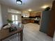 Well-lit kitchen has wooden cabinets, stainless steel appliances, and a tile floor at 1929 Hazelwood Se Dr, Marietta, GA 30067