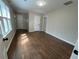 Spacious living room with hardwood floors, multiple doorways and natural light at 1929 Hazelwood Se Dr, Marietta, GA 30067