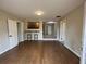 Open living area offering hardwood floors, bar seating and open concept at 1929 Hazelwood Se Dr, Marietta, GA 30067