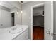 Bathroom with modern vanity and updated lighting fixtures at 2458 Haverford Way, Decatur, GA 30032