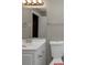 Bathroom with modern sink and vanity with new fixtures and toilet at 2458 Haverford Way, Decatur, GA 30032