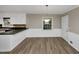 Eat-in dining area with stylish wainscoting, modern lighting and convenient access to kitchen at 2458 Haverford Way, Decatur, GA 30032