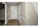 Inviting entryway with neutral paint, white trim, and wood-look flooring at 2458 Haverford Way, Decatur, GA 30032