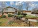 Charming brick home with well-manicured front yard landscaping and an attached two-car garage at 2458 Haverford Way, Decatur, GA 30032