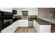 Fully equipped kitchen with sleek appliances, ample counter space, and custom cabinetry at 2458 Haverford Way, Decatur, GA 30032