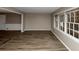 Spacious living area featuring wood-look floors and plenty of natural light at 2458 Haverford Way, Decatur, GA 30032
