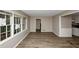 Living area with new wood-look flooring and lots of natural light at 2458 Haverford Way, Decatur, GA 30032
