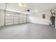 Large garage with new flooring and open space at 20 Trace Ct, Covington, GA 30016
