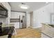 Stylish kitchen featuring stainless steel appliances, granite countertops and white cabinets at 20 Trace Ct, Covington, GA 30016