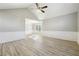 Spacious living room with high ceilings, ceiling fan, and decorative trim at 20 Trace Ct, Covington, GA 30016