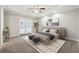 Spacious main bedroom with trey ceilings, french doors to backyard, and neutral tones at 20 Trace Ct, Covington, GA 30016