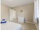 Cozy bedroom featuring a double bed, soft natural lighting, and neutral decor at 4064 Chimney Ridge Way, Ellenwood, GA 30294